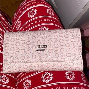 Guess pink wallet.. It doesn’t have any defect